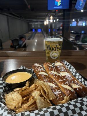 Come bowl and order pretzel Sticks and house seasoned chips with your favorite beverage.