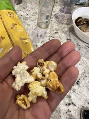 Staled and burnt popcorn