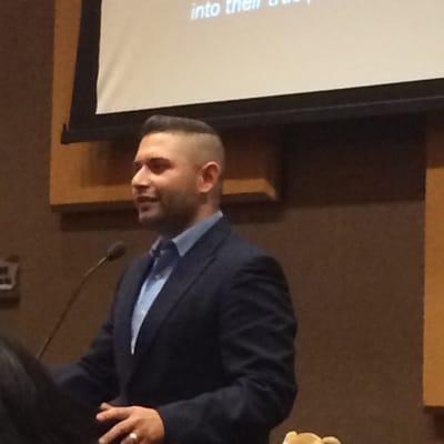 Edgar Olivo speaking at the Tohono O'odham Educational Leaders Conference in 2014.