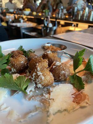 Prosciutto and hush puppy appetizer