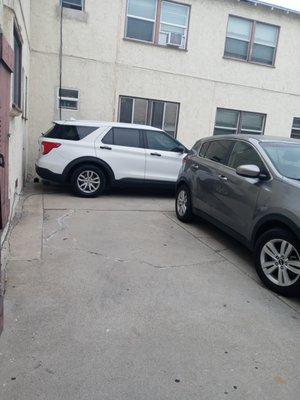 CARS BLOCKING PASSAGEWAYS FOR TRASH TO BE THROWN OUT IS DIRTY & A SAFETY VIOLATION!