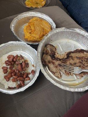 Carne asada, plantains, white rice and frijoles