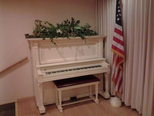 The stage is the perfect setting for a band and comes complete with a piano.