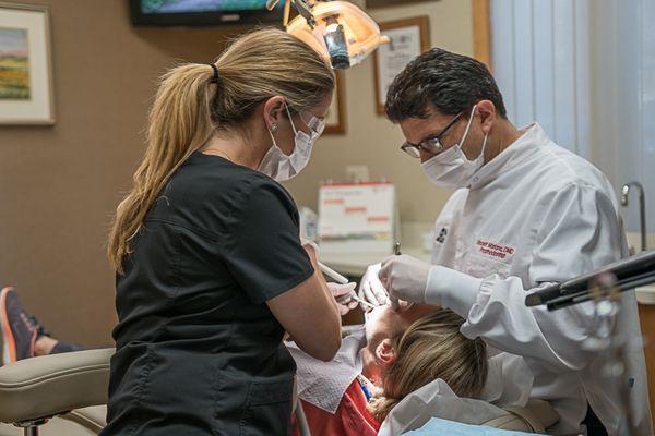 Dr. Mariano treating a patient