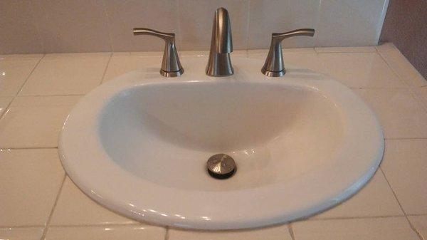 A new sink and faucet does wonders for this bathroom.