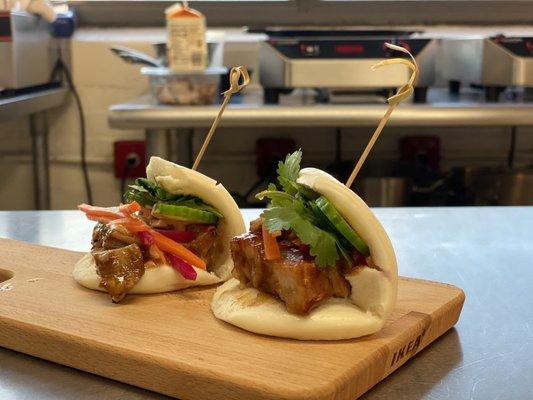 Pork bao bun, pickled carrot, daikon, cilantro, cucumber