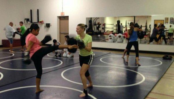 Muay Thai Kickboxing is a fun total body workout! It's also an effective Self-defense art!