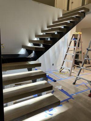 Half way through the installation, we had under mount stair lights put in.