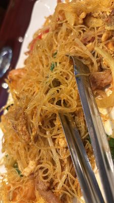 Singapore noodles partially eaten