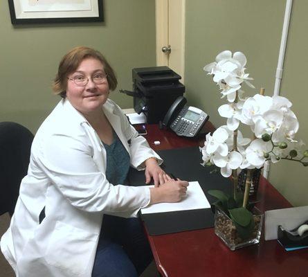 Dr. Stackpole at her desk.