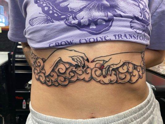 Higher self tattoo on stomach