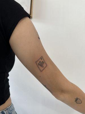 Stamp tattoo done by Inked By L.A