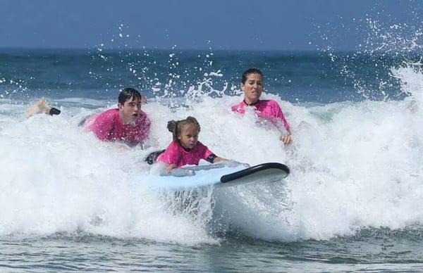 Lucy Ashley goes surfing with the Life Rolls on Foundation in Huntington Beach, CA