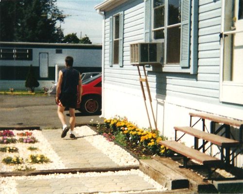 side walk, railroad ties , weed block fabric ,white stone, flowers install