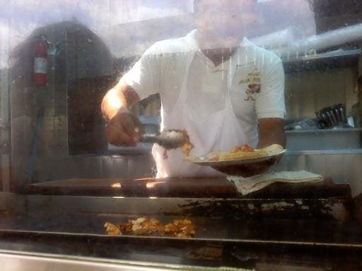 Chef in action.  This truck was on Potrero Ave., south of Rush Street