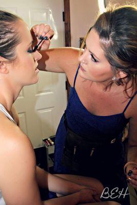 Caught in action dolling up Kristina for her wedding.