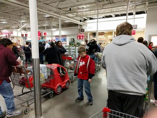 This kid about to bust a move to keep occupied in the long ass line.