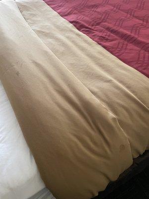 Blood stains in the bedspread