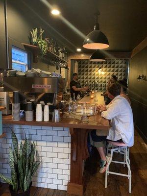 Bar area featuring wines, beers, provisions. Will be open for espresso and coffee 7:00 am daily.