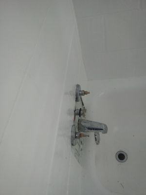 Shower knobs (with plastic knobs off) and broken shower stem