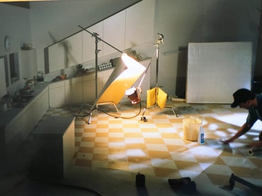 Construction of a Forced Perspective Commercial shoot.  cabinets are drastically sloped. tiles are cut short to make the kitchen look large