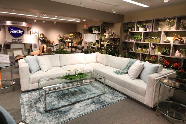 Sectional coffee table, artwork, rug and pillows at ETC for the home.