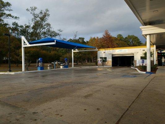 The car wash and vacuum station.