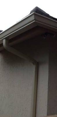 South FL Gutters Depot gutter leading to downspout