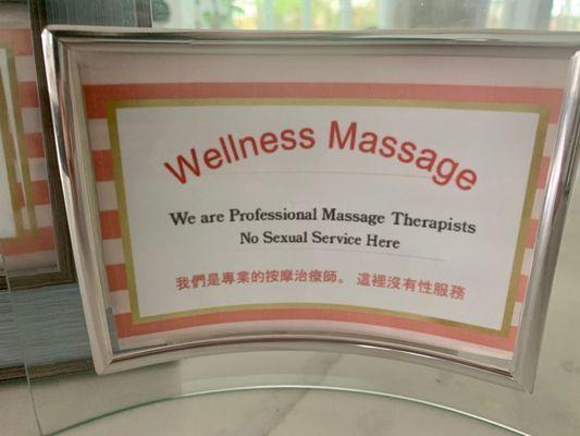 This made me feel at ease.  Framed sign: professional massage therapists, no sexual services.