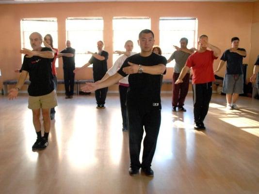 True Tai Chi™ assistant instructor, Henry Hsiang, leading students through 'Beginning Tai Chi'