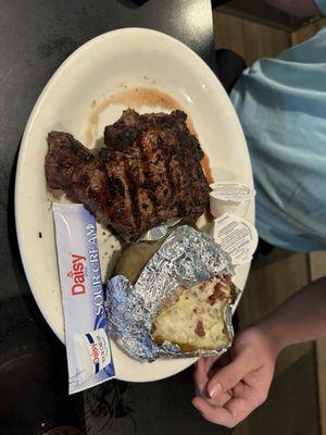 Ribeye and loaded baked potato