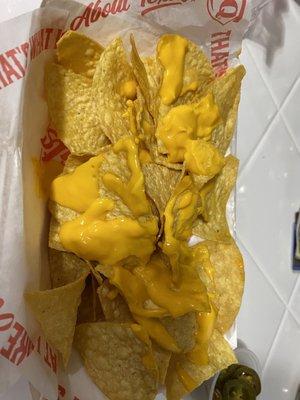 Cold cheese nachos.  This is what they consider "extra" cheese ‍