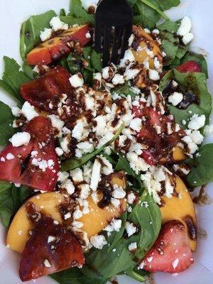 Fresh Greens and herbs salad with fruit and raspberry vinaigrette