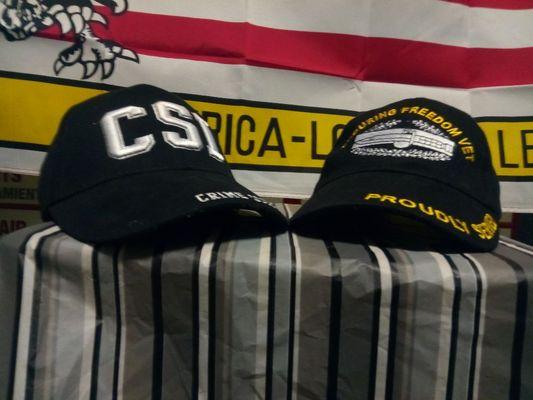 CSI and proudly served baseball caps