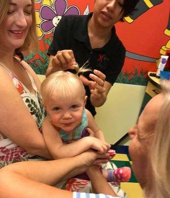 Natalia working her magic at Baby's First Haircut