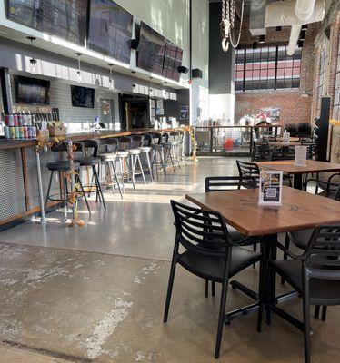 Lots of comfy bar stools at the bar.