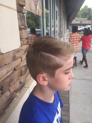 Haircut by Jason 8-25-17. Looks great. I am very pleased and so is my son.