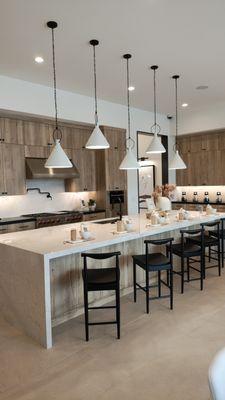 Installed 5 lighting fixtures in kitchen island area.