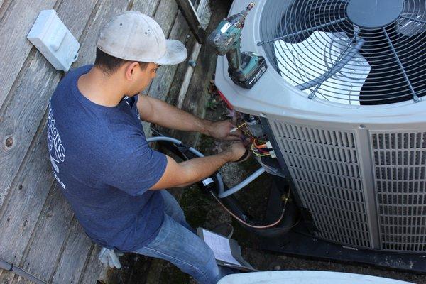 Repairing the outside unit known as the condeser.