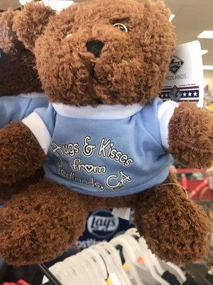 Cute Teddy bear. Shirt says Hugs & Kisses from Redlands, CA