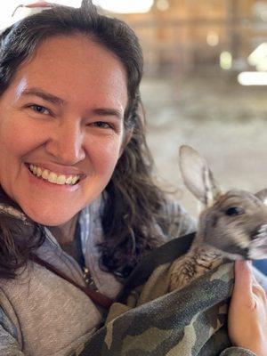 My wife with a baby Kangaroo.