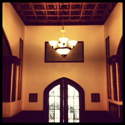 The lobby with its lovely gothic front door entrance and 1920s details.