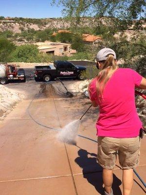 Remove oil, grease, rust, and paint from concrete driveways