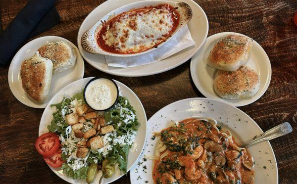 Lasagna, breads, salad, chefs choice pasta 10/10