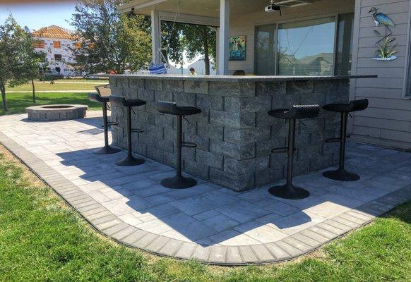 Paver Patio, Fire Pit, Outdoor Kitchen/Fire Table.