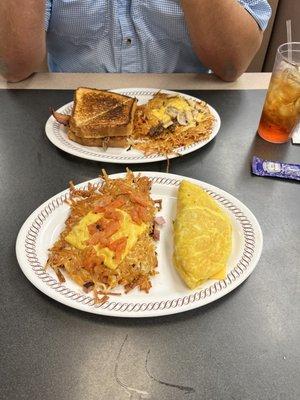 Bacon and cheese omelet.  Hash browns diced, chunked and covered and a steak and egg sandwich