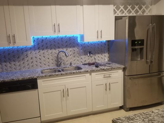 Kitchen Cabinet with LED lights Glass and Marble backslash with Granite Counter top Remodel