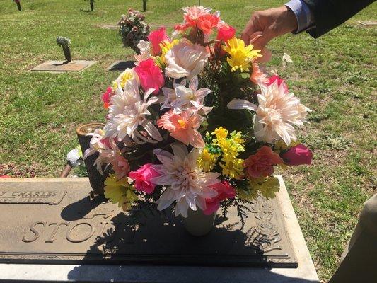 Silk cone arrangement...making this the fanciest gravesite in the section. Larger and prettier than I expected.