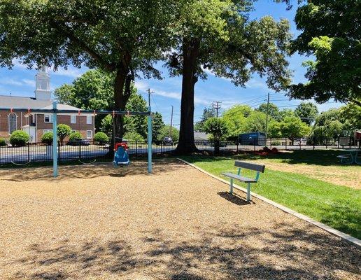 Big kid playground, fenced in, shade and picnic tables also available, grass to play in.