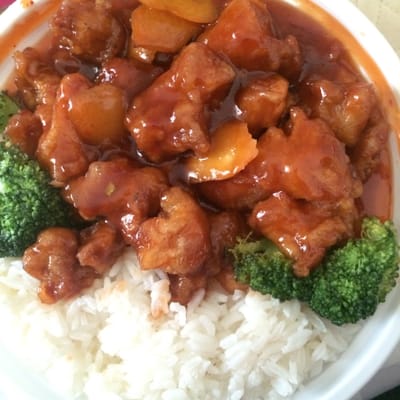 Orange chicken lunch special with white rice instead of pork fried rice.